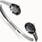 Bangle bracelet with two oval faceted black crystals